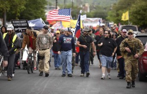 Members of Open Carry Texas and supporters stage a march in Olmos Park on Saturday, April 7, 2018. They were demanding that police chief Rene Valenciano lose his job over what they say is unfair treatment of their members.