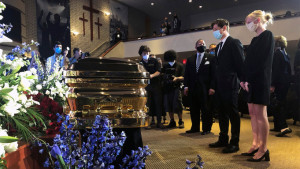 Mandatory Credit: Photo by Bebeto Matthews/AP/Shutterstock (10669840a) Minneapolis Mayor Jacob Frey, second from right, and First Lady Sarah Clarke, right pause before George Floyd's casket, before a memorial service for Floyd in Minneapolis George Floyd Memorial, Minneapolis, United States - 04 Jun 2020